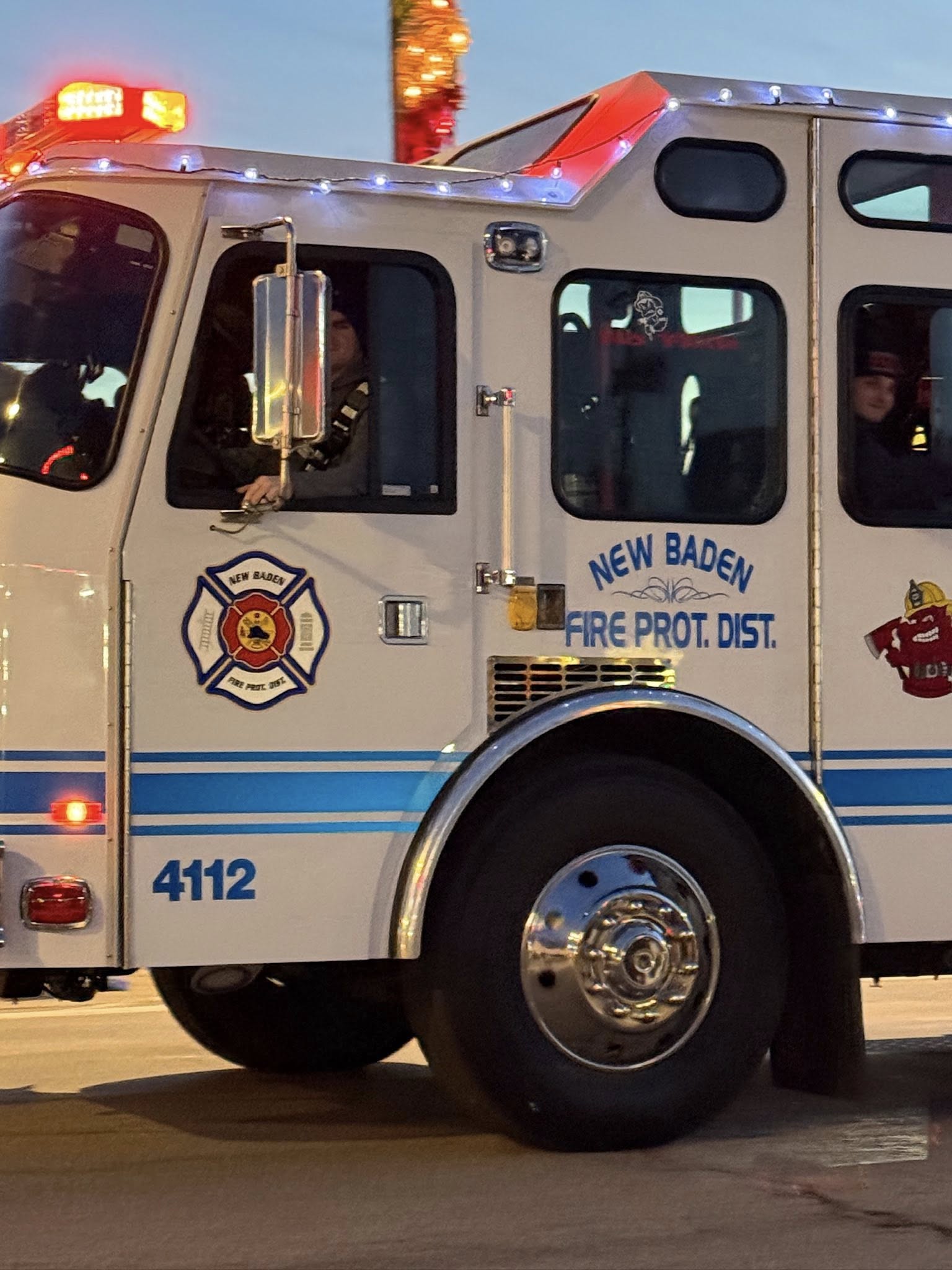Engine 4112, New Baden Fire Protection District — white body with navy blue stripes and maltese cross logo